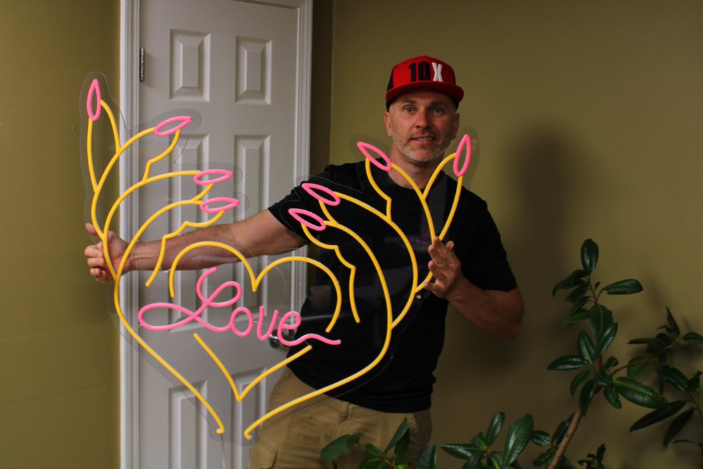 Always in Love custom neon LED sign with vibrant pink and red lights, featuring a romantic cursive design, perfect for weddings, anniversaries, and bedroom decor.