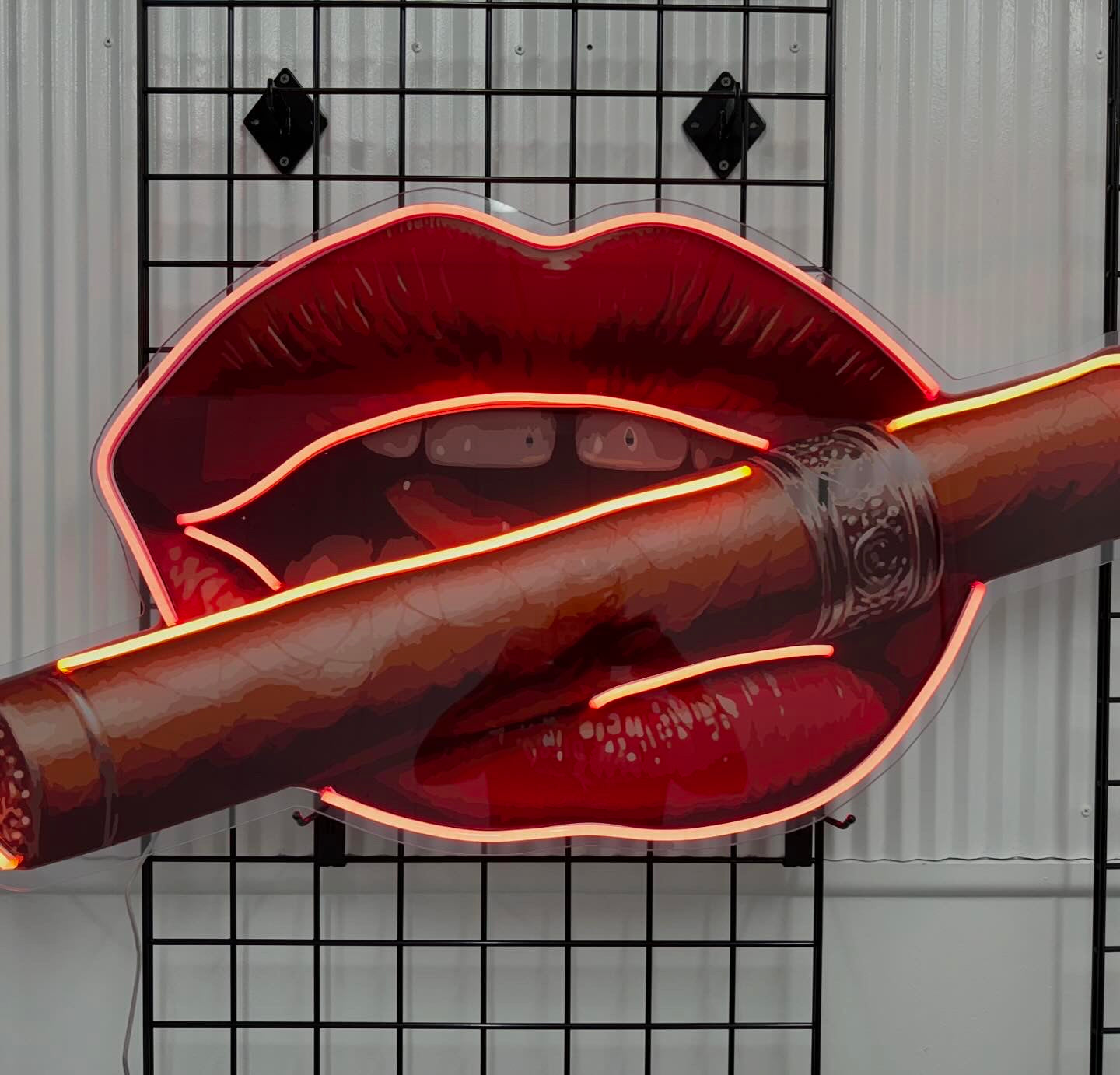 Luscious lips with cigar custom neon LED sign featuring a bold, vibrant design, perfect for a glamorous or vintage-themed decor.
