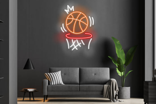 'Basketball in Net' custom neon LED sign featuring a vibrant basketball swishing through a net design, perfect for sports fans, game rooms, or athletic-themed decor.